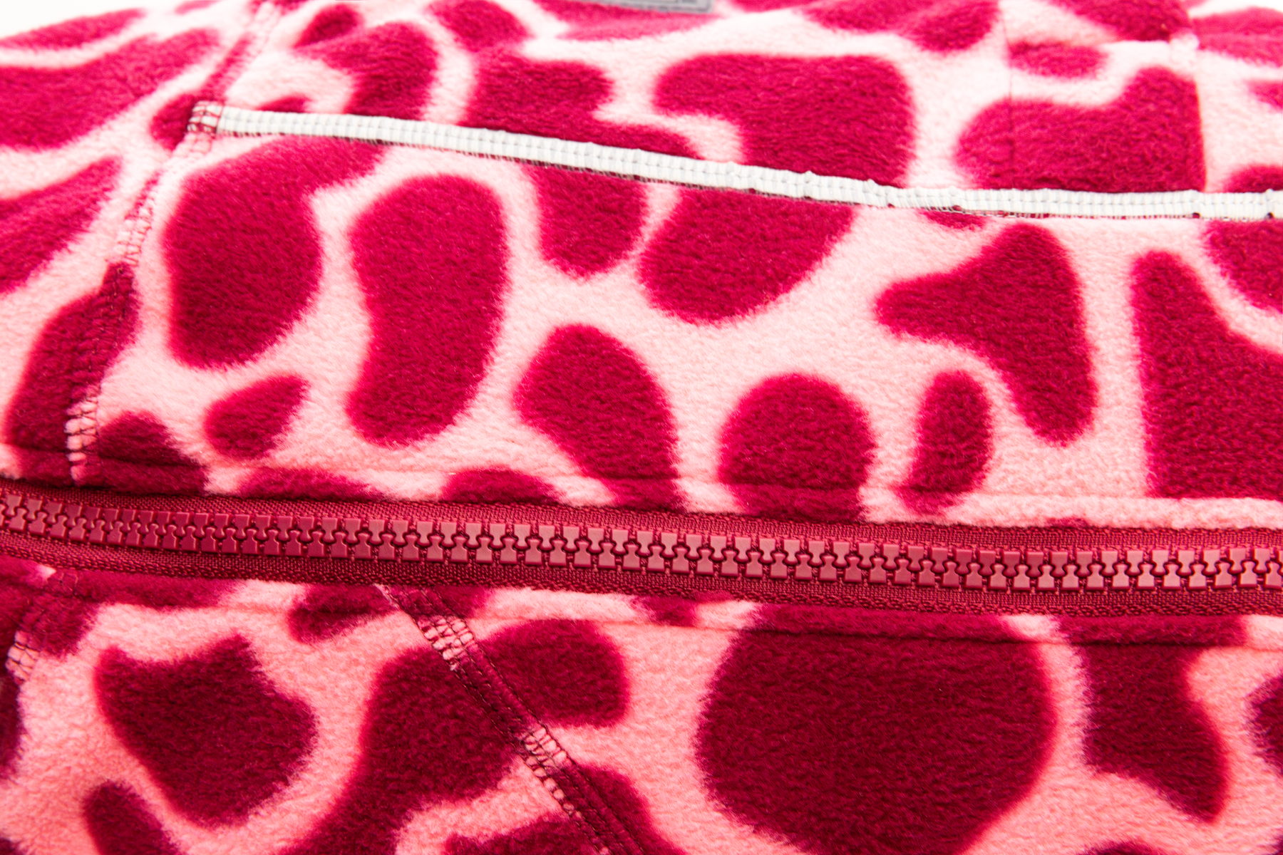Compressed_PNG-05504_Climate-Changer-Jacket_Berry-Lava_Detail_STUDIO.png